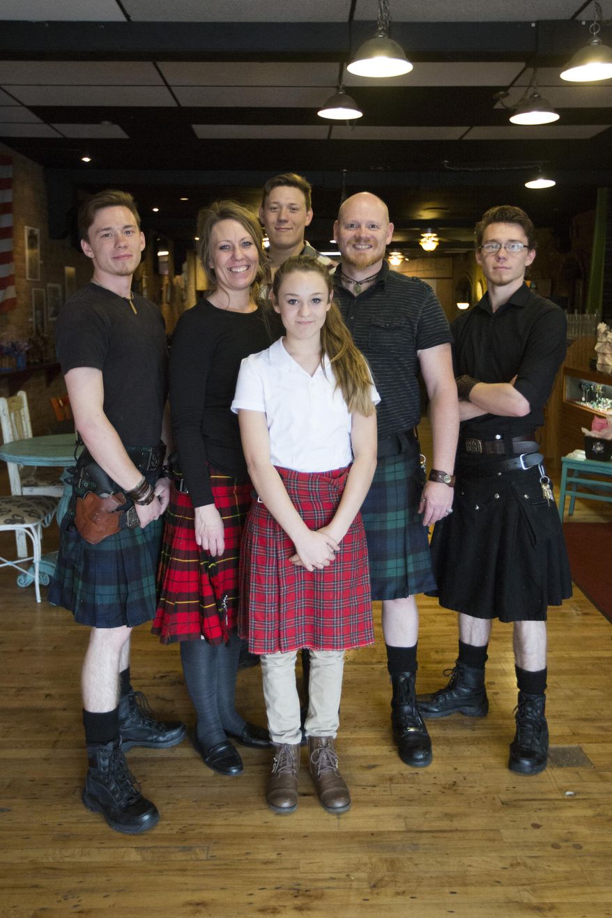 The Siebers family works at their restaurant "Sea Bears" in downtown Ogden on Friday, March 11, 2016. Sea Bears Ogden Fish House, a downtown restaurant on Washington Boulevard, is quickly becoming known for three things: the food, the servers clad in Scottish kilts and the sidearms those servers openly carry while they work. (Briana Scroggins/Standard-Examiner via AP) MANDATORY CREDIT, LOCAL TV OUT