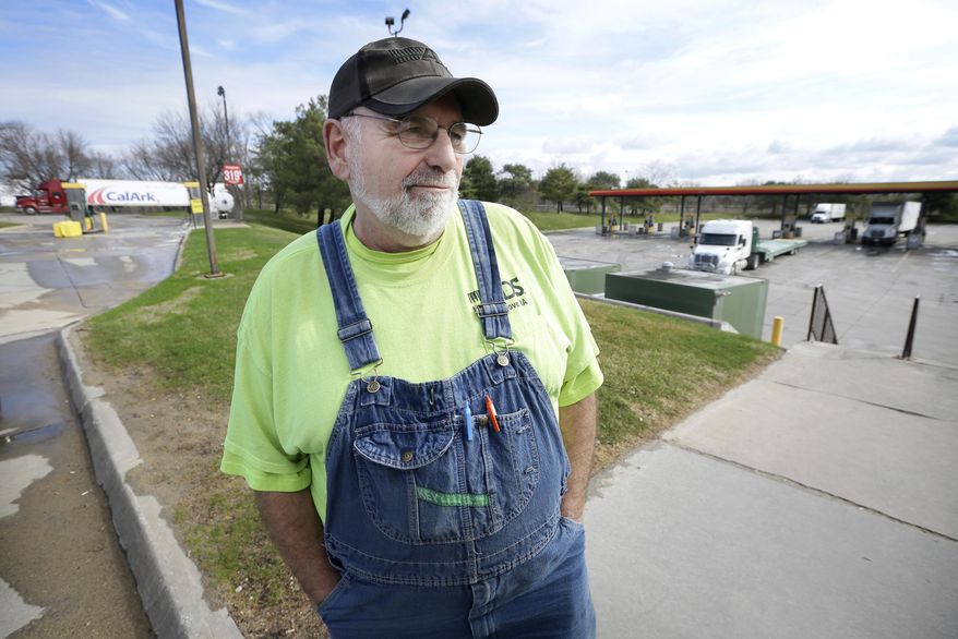 Truck driver Herb Schreur, of Eagle Grove, Iowa, talks about proposed speed limit changes after refueling at a truck stop, Tuesday, March 15, 2016, in Clive, Iowa. Efforts to increase speed limits on Iowa freeways and rural roads failed in the Legislature this year amid safety concerns, but officials acknowledged such moves are popular with drivers and likely will come before lawmakers again. (AP Photo/Charlie Neibergall)