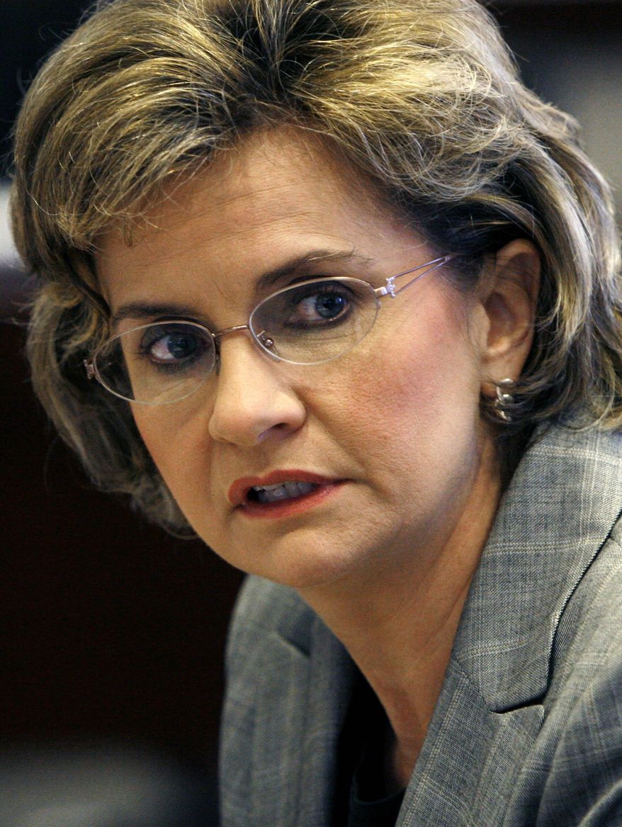 FILE - In this Dec. 13, 2006 photograph, then Mississippi Lt. Gov. Amy Tuck speaks before a Joint Legislative Budget Committee in Jackson, Miss. Tuck, now a Mississippi State University vice president, shut down her campaign committee in the closing days of 2013, and took the $158,342 remaining in the account, which is allowed by law. Mississippi is one of five states where withdrawals are legal so long as state and federal income taxes are paid, with no restrictions on how it’s spent. (AP Photo/Rogelio V. Solis, File)