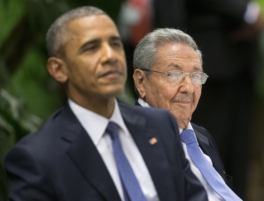 U.S. President Barack Obama, left, attends a State Dinner hosted by Cuban President Raul Castro, right, at the Palace of the Revolution, Monday, March 21, 2016, in Havana, Cuba. (AP Photo/Pablo Martinez Monsivais)