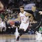 Maryland guard Melo Trimble (2) drives against Hawaii guard Quincy Smith (11) during the first half of a second-round men&#39;s college basketball game in the NCAA Tournament in Spokane, Wash., Sunday, March 20, 2016. (AP Photo/Young Kwak)