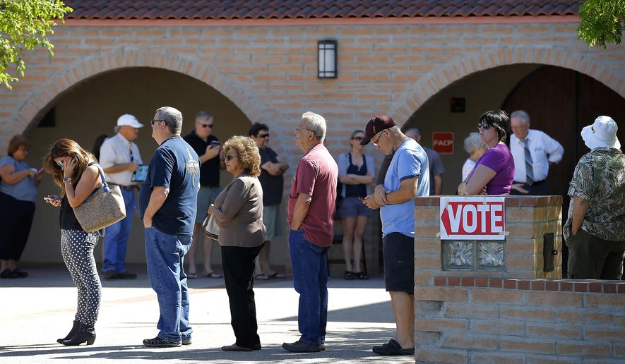 Voters wait in line to cast their ballot in Arizona&#39;s presidential primary election, Tuesday, March 22, 2016, in Gilbert, Ariz. (AP Photo/Matt York) ** FILE **