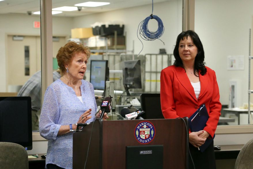 Maricopa County recorder Helen Purcell, left, and Secretary of State Michele Reagan speak during a news conference on Arizona’s Presidential Primary Election in Phoenix, on Monday, March 21, 2016. After a frenzied weekend of raucous campaign rallies across Arizona, election day is here. Voters go to the polls Tuesday for the presidential preference election. (AP Photo/Ryan Van Velzer)