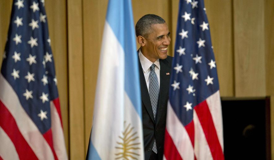 U.S. President Barack Obama arrives at a town hall meeting with young Argentines in Buenos Aires, Argentina, Wednesday, March 23, 2016. Obama is on a two day official visit to Argentina. (AP Photo/Natacha Pisarenko)