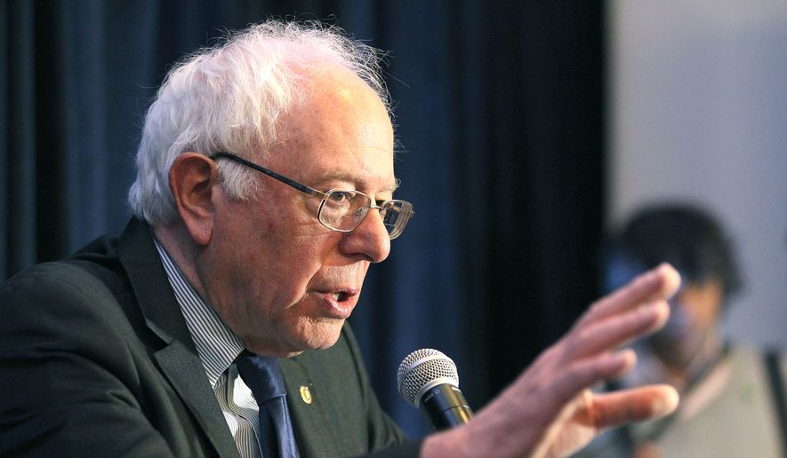 Presidential candidate Bernie Sanders speaks at a press conference at the Kona Kai Hotel in Shleter Island, Calif., before departing San Diego, Wednesday, March 23, 2016, the morning after a convention center rally. (John Gastaldo/San Diego Union-Tribune via AP)