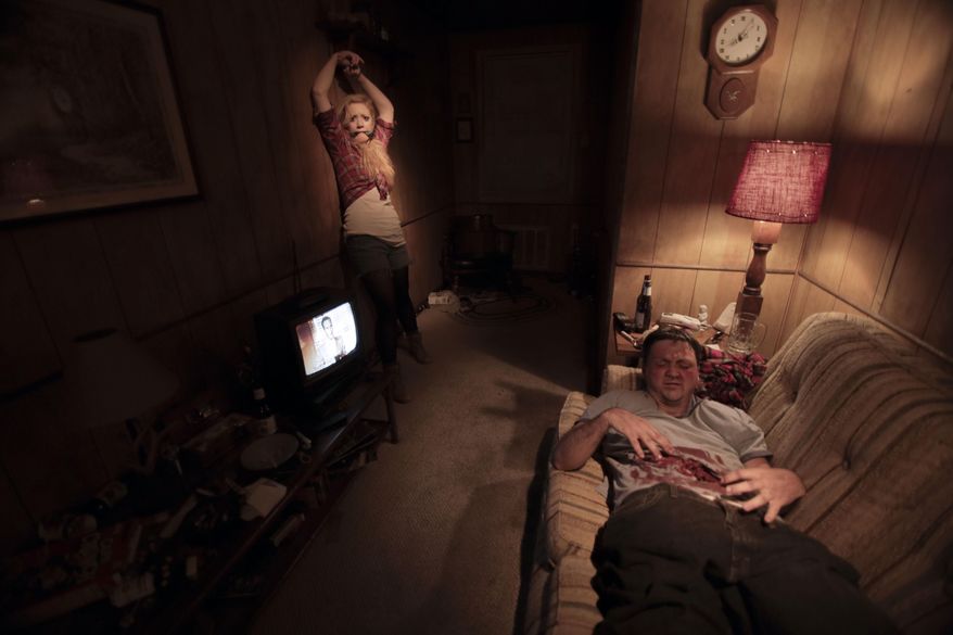 This undated image released by Walker Stalker Con shows a scene from "The Walking Dead Experience - Chapter One," a touring immersive show based on the popular zombie series on AMC. The show is a natural extension of Walker Stalker Con, the second largest fan convention in North America, which this year plans 16 events across America, a meetup in London in February and a cruise to the Bahamas. (Caleb Sharp/Walker Stalker Con via AP)