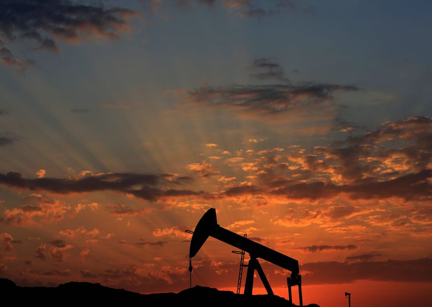 Oil producers are forecast to keep flooding the market, pulling down prices despite growing demand in the U.S. and emerging markets. (Associated Press)