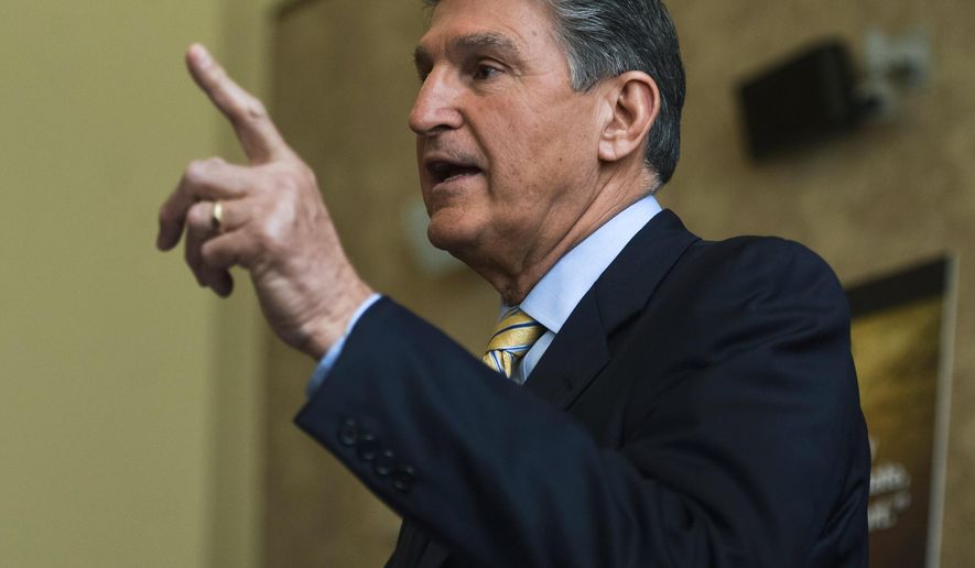 Sen. Joe Manchin, West Virginia Democrat, speaks during a public town hall meeting on President Obama&#39;s nomination of Merrick Garland to the U.S. Supreme Court in the Ceremonial Courtroom of the W. Kent Carper Justice &amp; Public Safety Complex in Charleston, West Virginia, March 24, 2016. Manchin, a Democrat whose conservative-leaning state has voted solidly Republican in recent national elections, faces a more challenging political calculation over Obama’s pick than many other Senate Democrats. (Christian Randolph/Charleston Gazette-Mail via AP) **FILE**