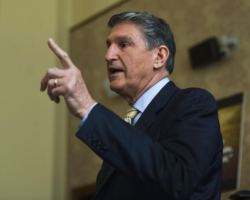 Sen. Joe Manchin, West Virginia Democrat, speaks during a public town hall meeting on President Obama&#39;s nomination of Merrick Garland to the U.S. Supreme Court in the Ceremonial Courtroom of the W. Kent Carper Justice &amp; Public Safety Complex in Charleston, West Virginia, March 24, 2016. Manchin, a Democrat whose conservative-leaning state has voted solidly Republican in recent national elections, faces a more challenging political calculation over Obama’s pick than many other Senate Democrats. (Christian Randolph/Charleston Gazette-Mail via AP) **FILE**