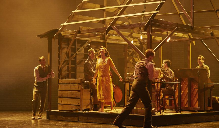 This image released by DKC/O&M shows Carmen Cusack , center, and the cast in "Bright Star," in New York. (Nick Stokes/DKC/O&M via AP)