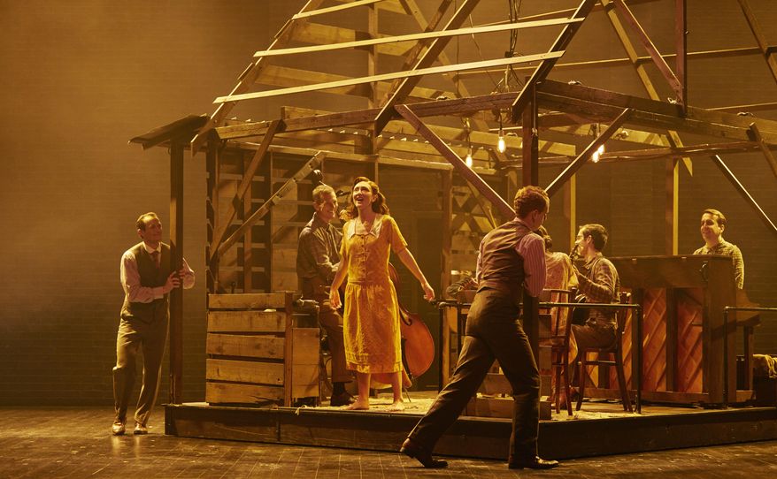 This image released by DKC/O&M shows Carmen Cusack , center, and the cast in "Bright Star," in New York. (Nick Stokes/DKC/O&M via AP)