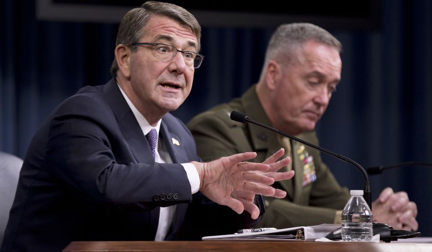 Defense Secretary Ash Carter, left, accompanied by Joint Chiefs Chairman Gen. Joseph Dunford, speaks during a news conference at the Pentagon, Friday, March 25, 2016, where he announced U.S. forces killed a senior Islamic State leader, among several key members of the militant group eliminated this week. (AP Photo/Mauel Balce Ceneta)