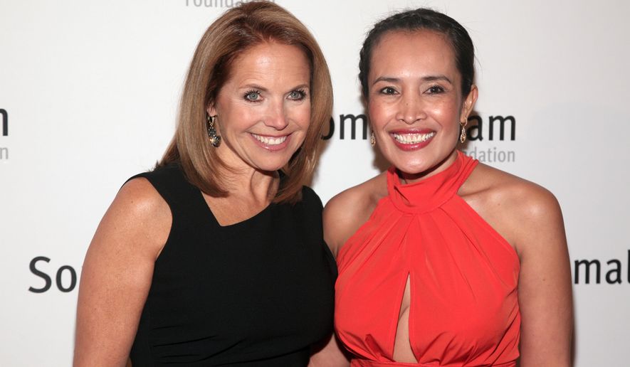 Human rights advocate Somaly Mam (right) — pictured here with television journalist Katie Couric — was forced to resign as president of the Somaly Mam Foundation in 2014 after press reports revealed she had fabricated her background and coached girls to lie about their childhoods to grab headlines and raise money. (Associated Press)
