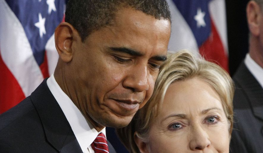 President-elect Barack Obama, left, stands with Secretary of State-designate Sen. Hillary Rodham Clinton, D-N.Y., right, at a news conference in Chicago, Dec. 1, 2008. (AP Photo/Pablo Martinez Monsivais) **FILE**