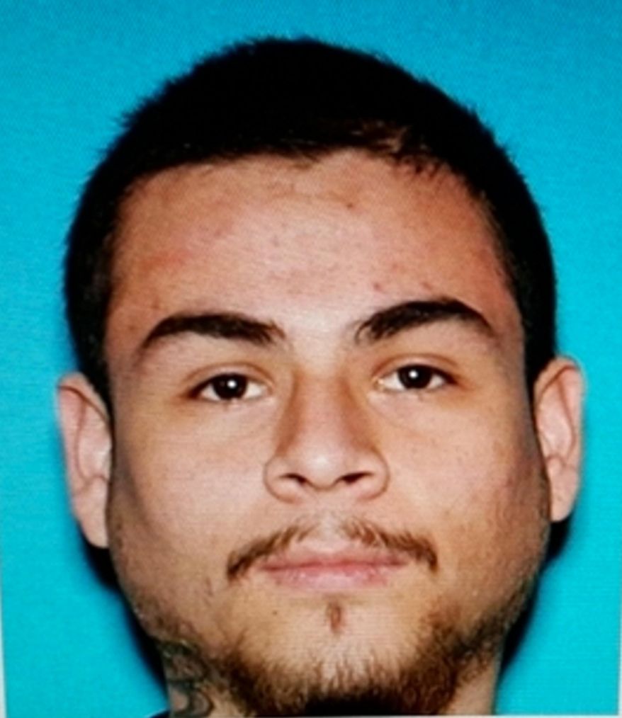 This undated photo released by the Bell Gardens, Calif., Police Department shows Bryan Rojas. Los Angeles County authorities are searching for an alleged hit-and-run driver following a deadly crash in the city of South Gate. Police say Rojas had an injury to his forehead when he fled the scene of the violent collision Saturday, March 26, 2016. (Bell Gardens Police Department via AP)