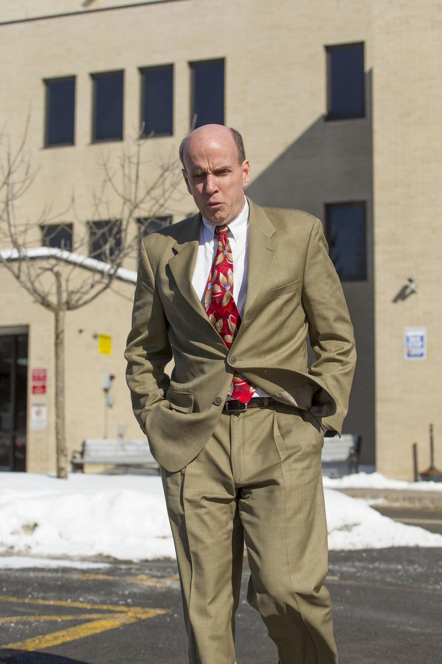 FILE - In this Feb. 5, 2015, file photo, Calvin Harris walks out of the Schoharie County Courthouse after the Tioga County district attorney made his opening statement in his third trial in Schoharie, N.Y. For the fourth time since Michele Harris disappeared in 2001, her estranged husband Harris will go on trial for murder in upstate New York. Jury selection on the latest trial starts Monday, March 28, 2016. (Simon Wheeler/The Journal via AP, File) NO SALES; MANDATORY