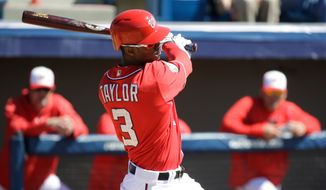 Washington Nationals&#39; Michael Taylor swings at a pitch during an intrasquad baseball game at a spring training workout, Sunday, Feb. 28, 2016, in Viera, Fla. (AP Photo/John Raoux)