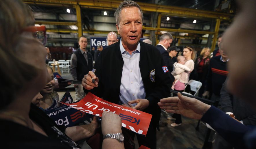 Republican presidential candidate, Ohio Gov. John Kasich works the crowd after a town hall meeting at the River Steel plant, Monday, March 28, 2016, in West Salem, Wis. (AP Photo/Charles Rex Arbogast)