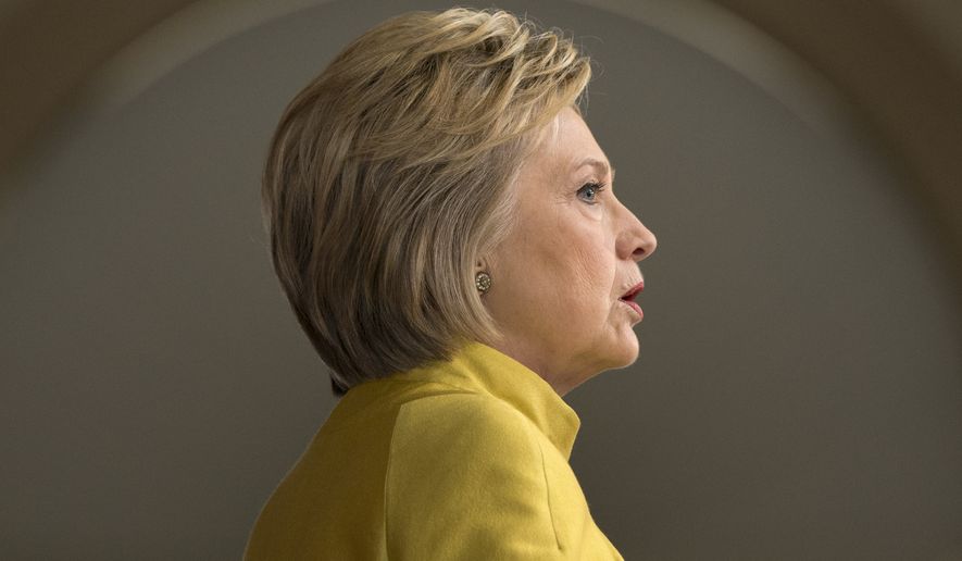 Hillary Clinton said her Supreme Court nominees would have to prove that they would uphold the Roe v. Wade decision establishing a national right to abortion and would have to show that they would overturn the Citizens United decision that established free speech campaign rights for interest groups. (Associated Press)