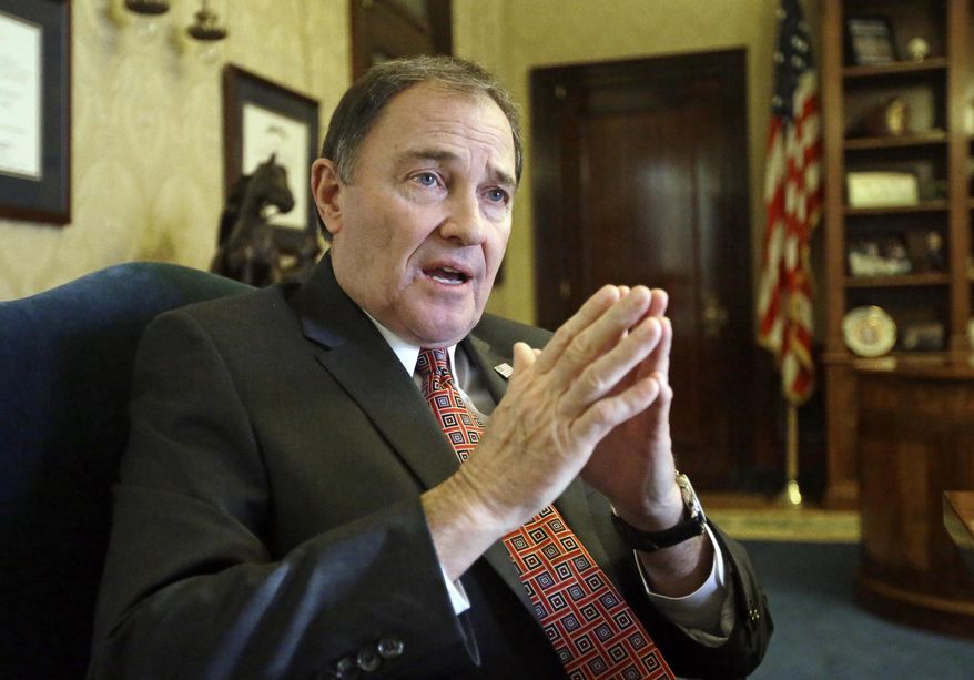FILE - March 10, 2016 file photo Utah Gov. Gary Herbert speaks during an interview in Salt Lake City. The Utah governor is considering whether to sign a bill that would make Utah the first state to require doctors to give anesthesia to women having an abortion at 20 weeks of pregnancy or later. (AP Photo/Rick Bowmer, File)