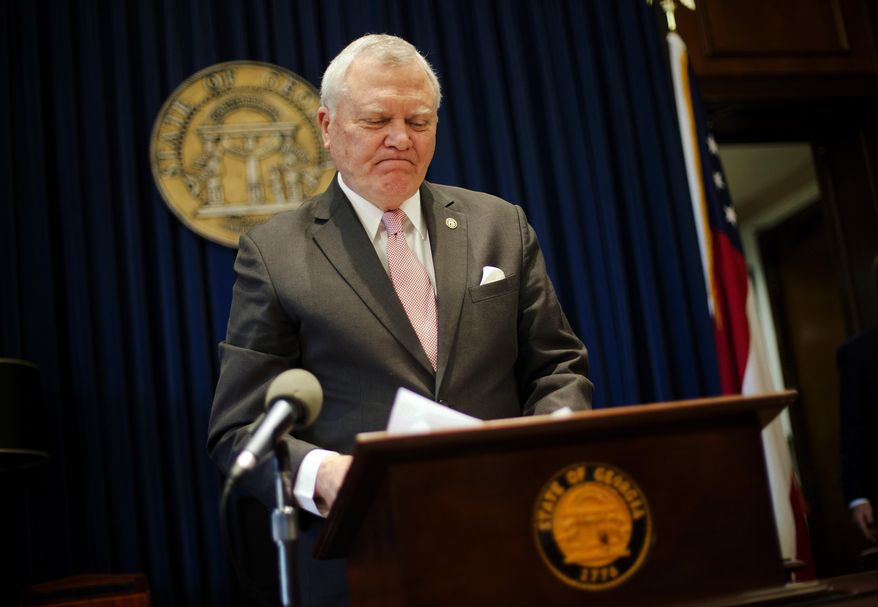 Georgia Gov. Nathan Deal speaks during a news conference as he announces he has vetoed legislation allowing clergy to refuse performing gay marriage and protecting people who refuse to attend the ceremonies Monday, March 28, 2016, in Atlanta. The Republican rejected the bill on Monday, saying "I have examined the protections that this bill proposes to provide to the faith based community and I can find no examples of any of those circumstances occurring in our state." (AP Photo/David Goldman)