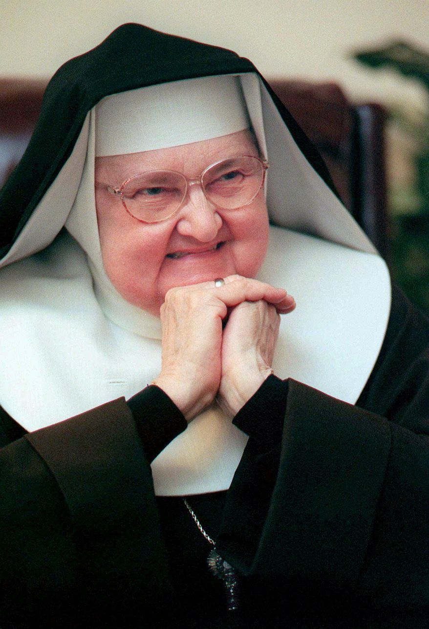 Mother Angelica, shown March 2, 1999, is both Mother Abbess of the Lady of Angels Monastery in Irondale, Ala., as well as chairman of the board or the Eternal Word Television Network.  Angelica, a folksy Roman Catholic nun who used a monastery garage to begin a television ministry that grew into a global religious media empire, had died. She was 92. (Philip Holman/Birmingham Post-Herald via AP)