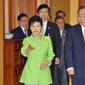 South Korean President Park Geun-hye, left, ushers U.N. Secretary-General Ban Ki-moon, right, at the presidential Blue House during their meeting in Seoul Friday, Aug. 23, 2013. (AP Photo/Jung Yeon-je, Pool)