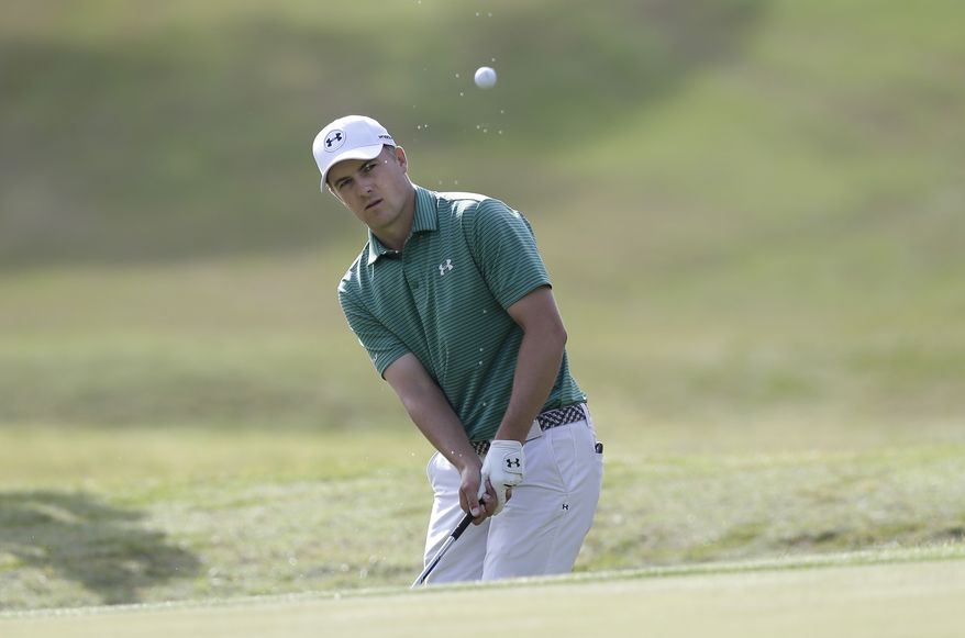 Jordan Spieth hits on the seventh hole during the round of 16 play against Louis Oosthuizen at the Dell Match Play Championship golf tournament at Austin County Club, Saturday, March 26, 2016, in Austin, Texas. (AP Photo/Eric Gay)