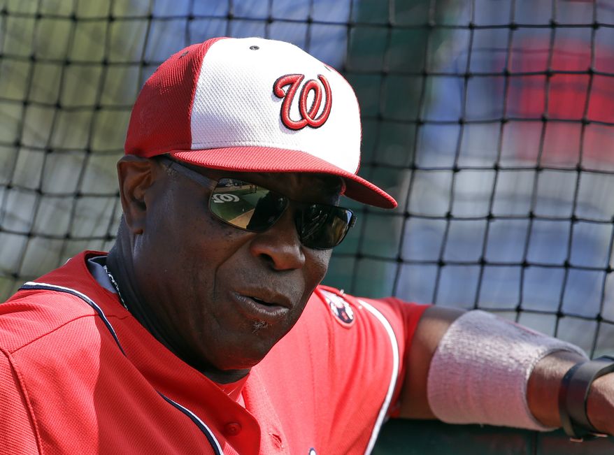 Washington Nationals manager Dusty Baker watches batting practice before a spring training baseball game against the New York Yankees, Wednesday, March 23, 2016, in Viera, Fla. (AP Photo/John Raoux)