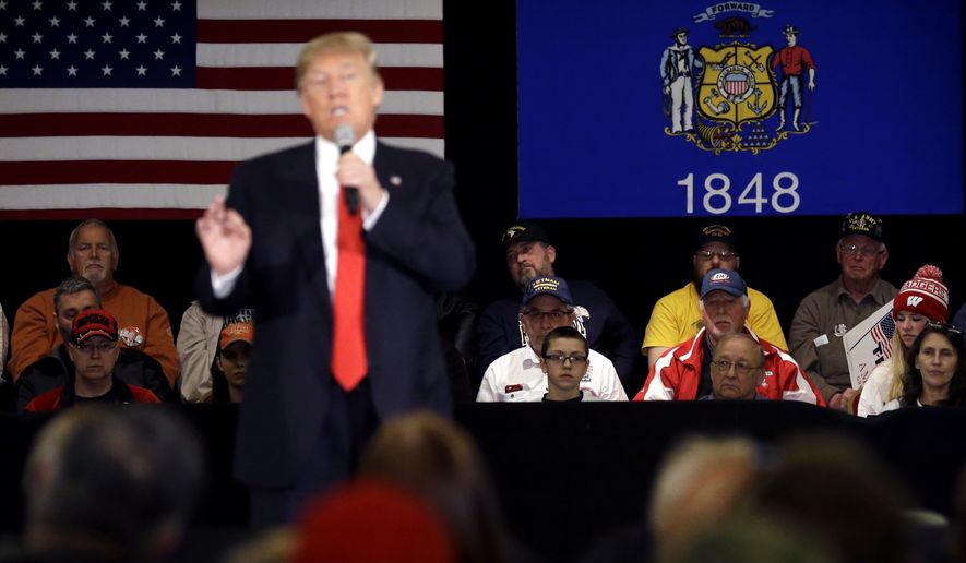 Supporters listen to Republican presidential candidate Donald Trump speech at a campaign stop Wednesday, March 30, 2016, in Appleton, Wis. (AP Photo/Nam Y. Huh)