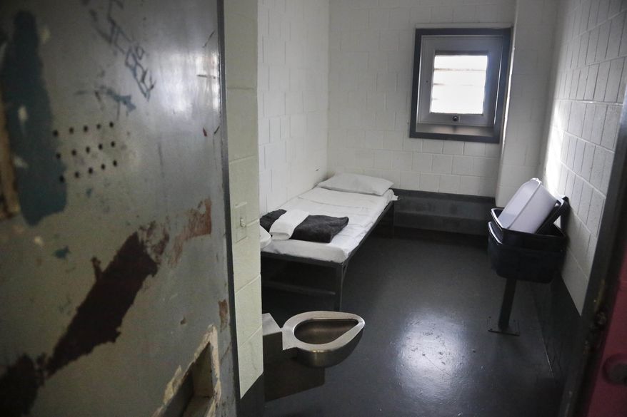 Inmates say they are stuck in isolation in cells roughly the size of a car parking space 21 to 24 hours a day. They say it leads to suicidal tendencies, depression, psychosis and degeneration of their bodies. (Associated Press/File)