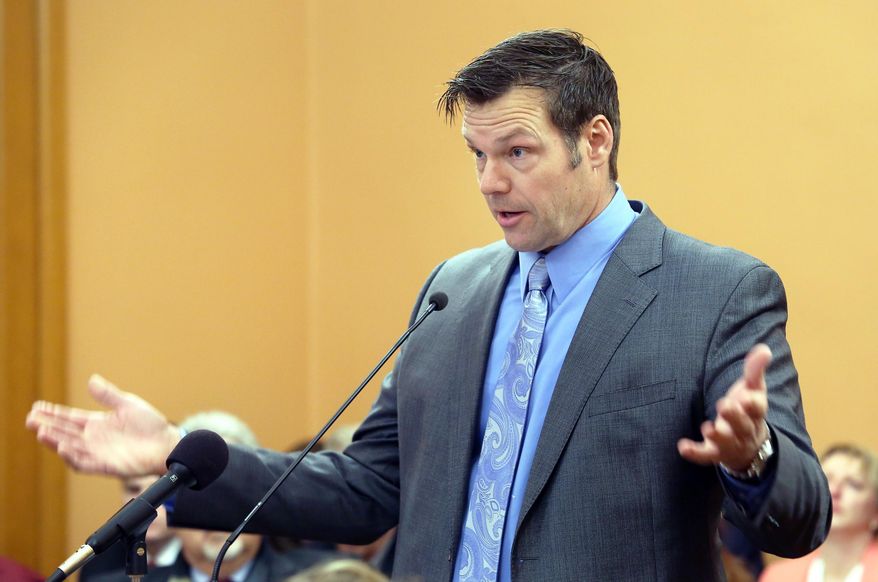 FILE- In this Jan. 25, 2016, file photo, House Elections Committee, Secretary of State Kris Kobach speaks in Topeka, Kan. Documents obtained by The Associated Press show Brian Newby told Kobach that he could count on him months before he was hired to head the U.S. Election Assistance Commission. The new executive then decided residents of Alabama, Kansas and Georgia can no longer register to vote using a national form without providing proof of U.S. citizenship. (Thad Allton/Topeka Capital-Journal via AP, File) MANDATORY CREDIT