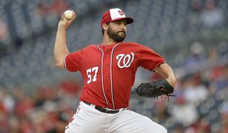 Washington Nationals starting pitcher Tanner Roark delivers a pitch against the Minnesota Twins during the first inning of an interleague exhibition baseball game, Friday, April 1, 2016, in College Park, Md. (AP Photo/Nick Wass)