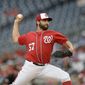 Washington Nationals starting pitcher Tanner Roark delivers a pitch against the Minnesota Twins during the first inning of an interleague exhibition baseball game, Friday, April 1, 2016, in College Park, Md. (AP Photo/Nick Wass)