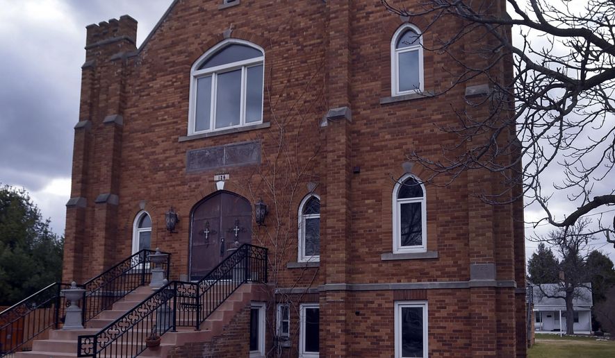 FOR RELEASE MONDAY, APRIL 4, 2016, AT 12:01 A.M. CDT.-Lori Keiser has converted this church, built in 1928, into her home in Waterford, Wisc. (Gregory Shaver/The Journal Times via AP)