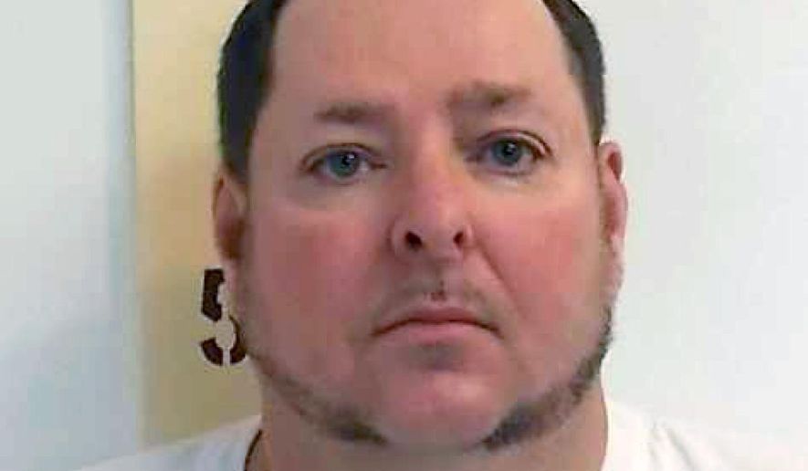 This Sept. 22, 2014 photo provided by the Iowa Department of Corrections shows inmate Gary Wayne Pettit. A judge has ruled that Pettit and other inmates have a constitutional right to have lawyers represent them during administrative proceedings that could lengthen their prison sentences. (Iowa Department of Corrections via AP)