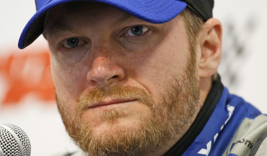 Sprint Cup driver Dale Earnhardt Jr., speaks to the media during a press conference at the Martinsville Speedway Friday, April 1, 2016 in Martinsville, Va. Earnhardt answered questions about his announcement that he is donating his brain to concussion research. (AP Photo/Steve Helber)