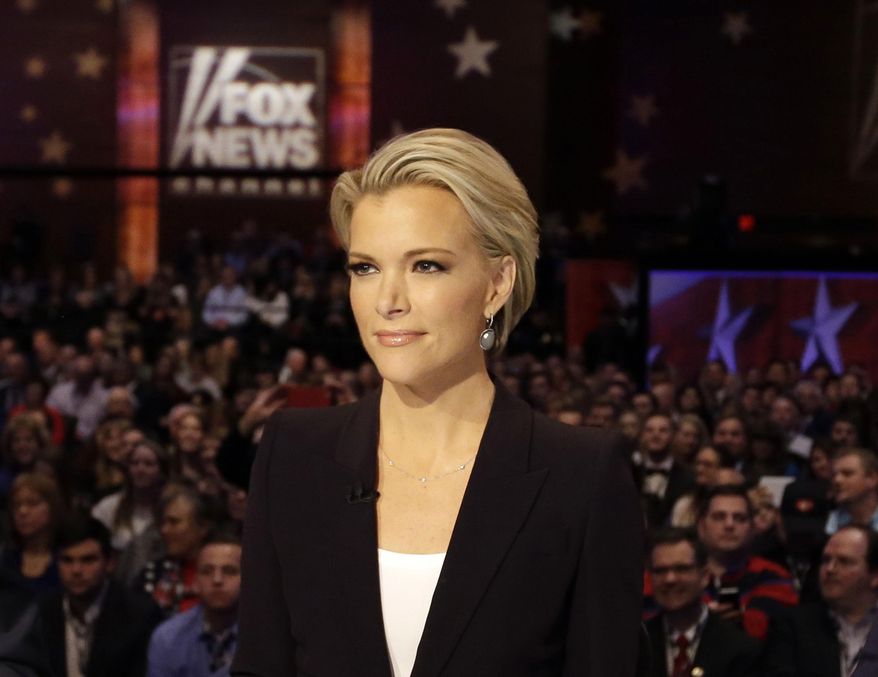 In this Jan. 28, 2016 photo, Moderator Megyn Kelly waits for the start of the Republican presidential primary debate in Des Moines, Iowa. Kelly, in an interview with Charlie Rose to air on CBS "Sunday Morning" on Sunday, April 3, said she wished colleague Bill O'Reilly had done more to defend her when he interviewed Trump before a January debate that the Republican skipped because he wanted Kelly removed as a moderator. She also criticized CNN for airing portions of a Trump rally on the night of that same debate. (AP Photo/Chris Carlson)