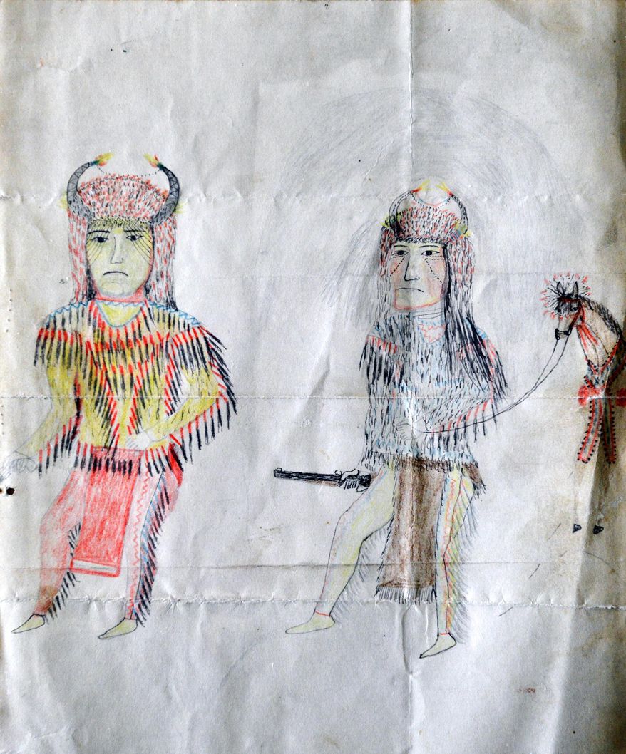 Ledger art on the back of a letter depicting two tribal men wearing ceremonial garb with a horse. (E.J. Harris/East Oregonian via AP)