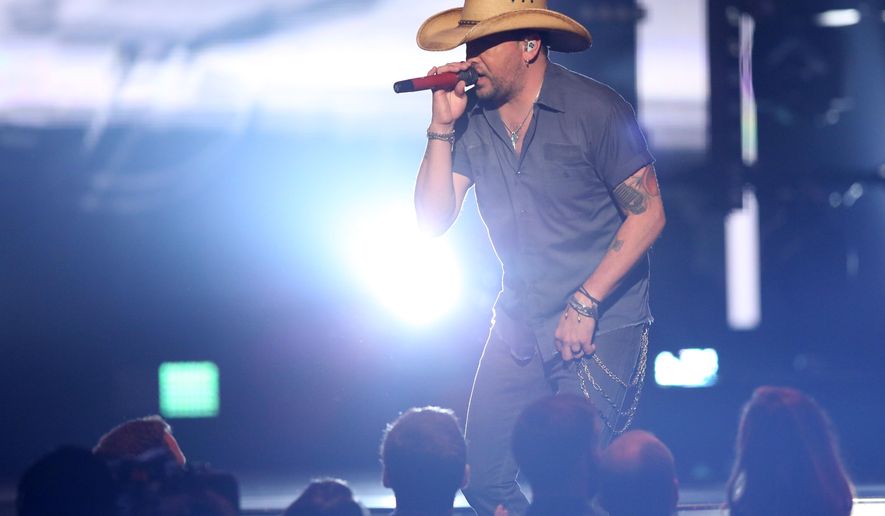 Jason Aldean performs “Lights Come On” at the 51st annual Academy of Country Music Awards at the MGM Grand Garden Arena on Sunday, April 3, 2016, in Las Vegas. (Photo by Matt Sayles/Invision/AP)