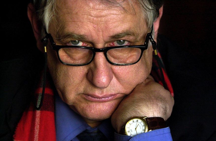 In this photo from Sept. 29, 2002, Bob Ellis attends the launch his new book "Goodbye Babylon" in Sydney, Australia. Ellis, an Australian author, journalist and speech writer for the center-left Labor Party died at his Sydney home of liver cancer on Sunday, April 3, 2016, his son said. He was 73 years old. (Mick Tsikas/AAP Image via AP) NO ARCHIVING, AUSTRALIA OUT, NEW ZEALAND OUT, PAPUA NEW GUINEA OUT, SOUTH PACIFIC OUT