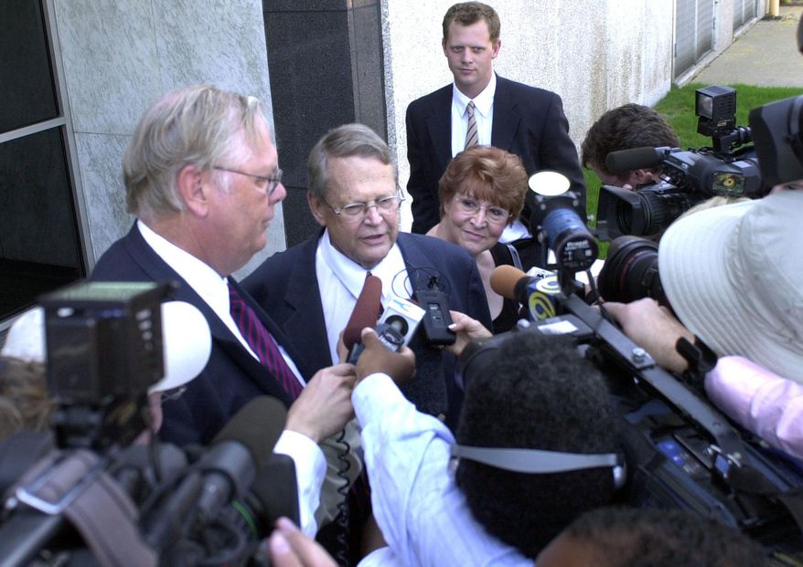 FILE -- In this June 15, 2005 file photo, Tennessee state Sen. Ward Crutchfield, center, answers reporters' questions following his plea of not guilty at his arraignment on bribery charges in Memphis, Tenn. Crutchfield, a former Tennessee Senate majority leader who served in the General Assembly for 31 years before he was convicted of bribery, died Sunday, April 3, 2016, in Chattanooga. He was 87. (AP Photo/Greg Campbell, File)