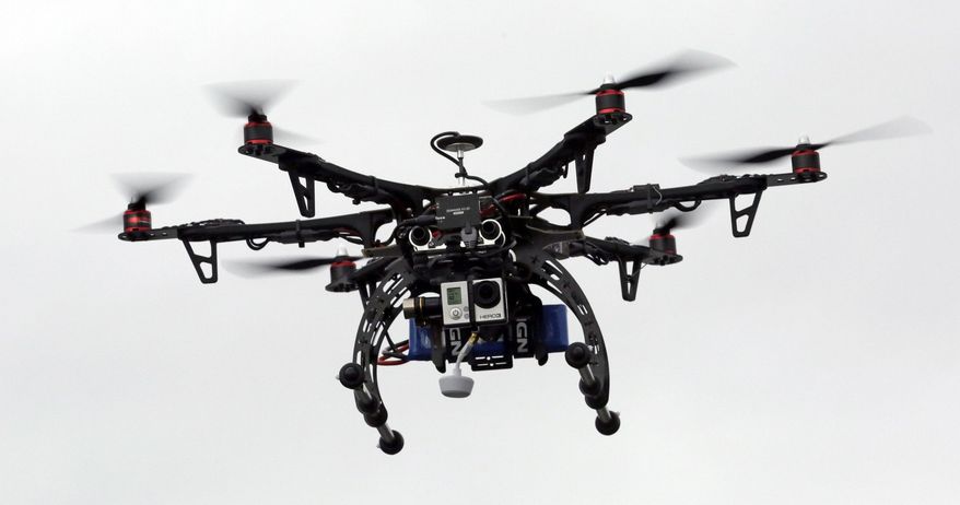 A commercial drone. (AP Photo/Rick Bowmer) ** FILE **