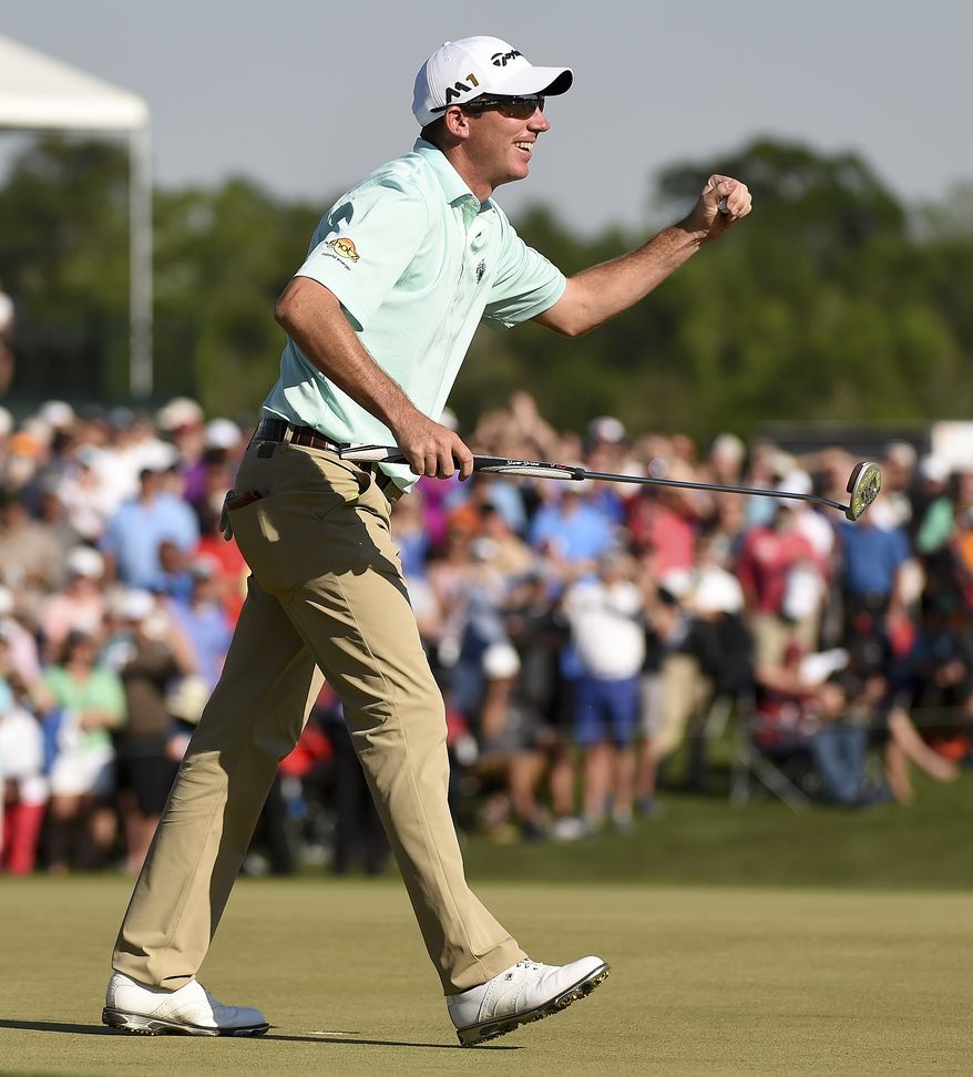 Jim Herman reacts after his par putt on the 18th green to win the Houston Open golf tournament, Sunday, April 3, 2016, in Humble, Texas. (AP Photo/Eric Christian Smith)