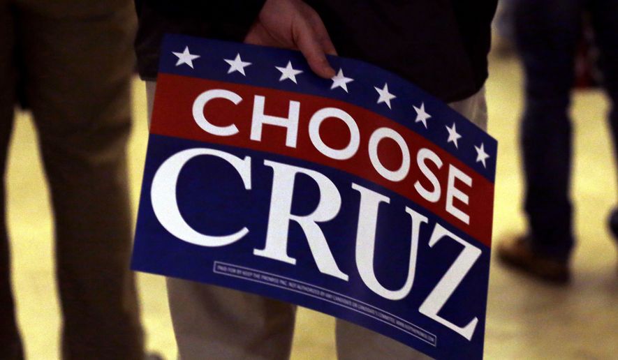 A supporter holds a sign as he waits for Republican presidential candidate, Sen. Ted Cruz&#x27;s campaign stop at Waukesha County Exposition Center, Monday, April 4, 2016, in Waukesha, Wis. (AP Photo/Nam Y. Huh)