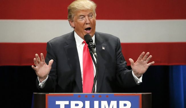 Republican presidential candidate Donald Trump addresses the crowd during a rally at the Milwaukee Theatre Monday, April 4, 2016, in Milwaukee. (AP Photo/Charles Rex Arbogast)