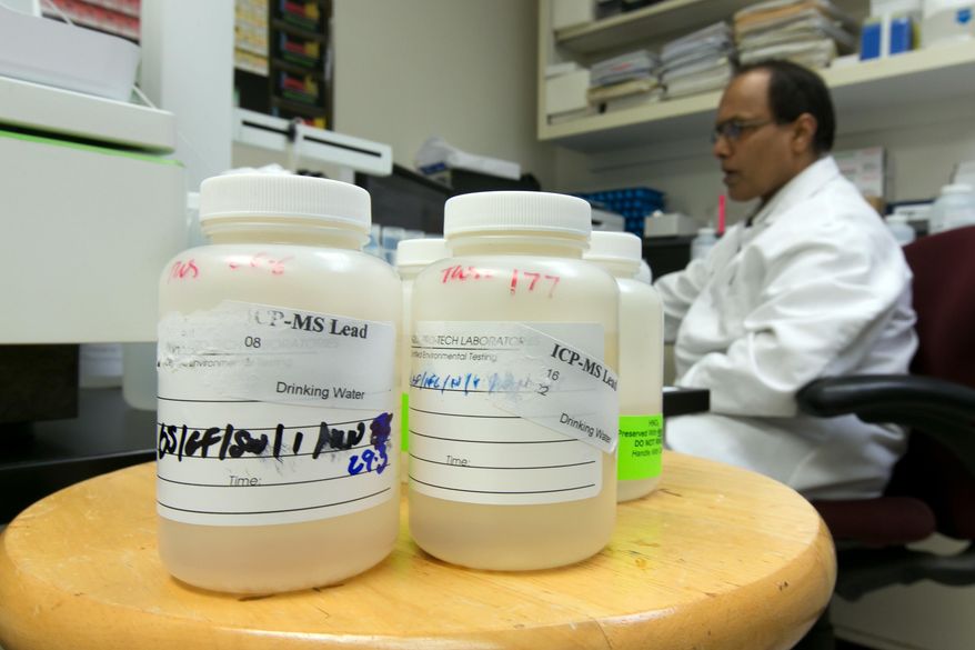 ADVANCE FOR SATURDAY, APRIL 9 AND THEREAFTER - In this Friday, March 25, 2016 photo, Director of Chemistry Ravi Swamy, of Aqua Pro-Tech Laboratories, uses inductively coupled plasma mass spectroscopy to test drinking water samples at the facility, in Fairfield, N.J. Responding to the crisis in Flint, Michigan, school officials across the country are testing for lead in the water flowing from classroom sinks and cafeteria faucets to reassure anxious parents or take action if they are surprised by the results. In March, the school district in Newark, New Jersey, shut off sinks and fountains in 30 buildings in response to high lead samples while offering to test as many as 17,000 children for lead contamination. (AP Photo/Richard Drew)