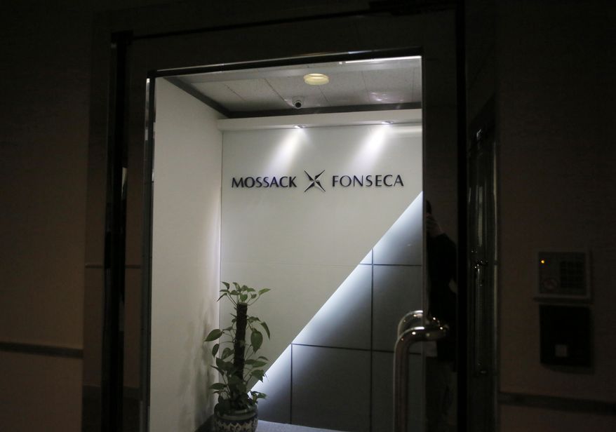 The entrance of the regional head office of Panama-based law firm Mossack Fonseca, one of the world's biggest creators of shell companies, in Hong Kong, America's openness to foreign tax evaders is coming under new scrutiny after the leak this week of 11.5 million confidential documents from the Panamanian law firm. The Panama Papers show how some of the world's richest people hide assets in shell companies to avoid paying taxes. (AP Photo/Vincent Yu)