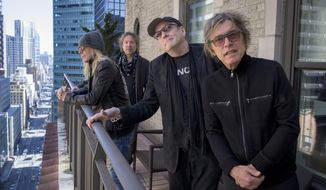 In this April 5, 2016 photo, members of Cheap Trick, from left, Robin Zander, Daxx Nielsen, Rick Nielsen and Tom Petersson pose for a portrait in New York to promote their new album, &amp;quot;Bang Zoom Crazy…Hello.&amp;quot; The band will perform with former member Bun E. Carlos at their Rock and Roll Hall of Fame induction ceremony on Friday. (Photo by Drew Gurian/Invision/AP)