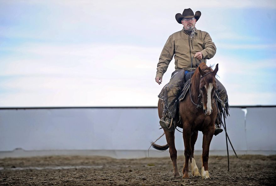 In this photo taken March 10, 2016, Vince Bellon trains a cutting horse at Riverbend Ranch in Idaho Falls, Idaho. He has to warm the horse up with start-stop drills, not unlike an athlete preparing for a football game. “This is my agenda, not his. He may still want to be sitting in a stall eating hay, or swishing flies,” Bellon said. (Pat Sutphin(/The Idaho Post-Register via AP) MANDATORY CREDIT